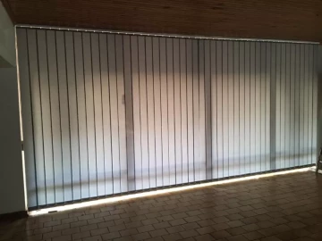 Vertical blind have the ability to create many ambiences in a room -Commercial
