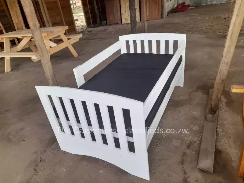Painted cot bed